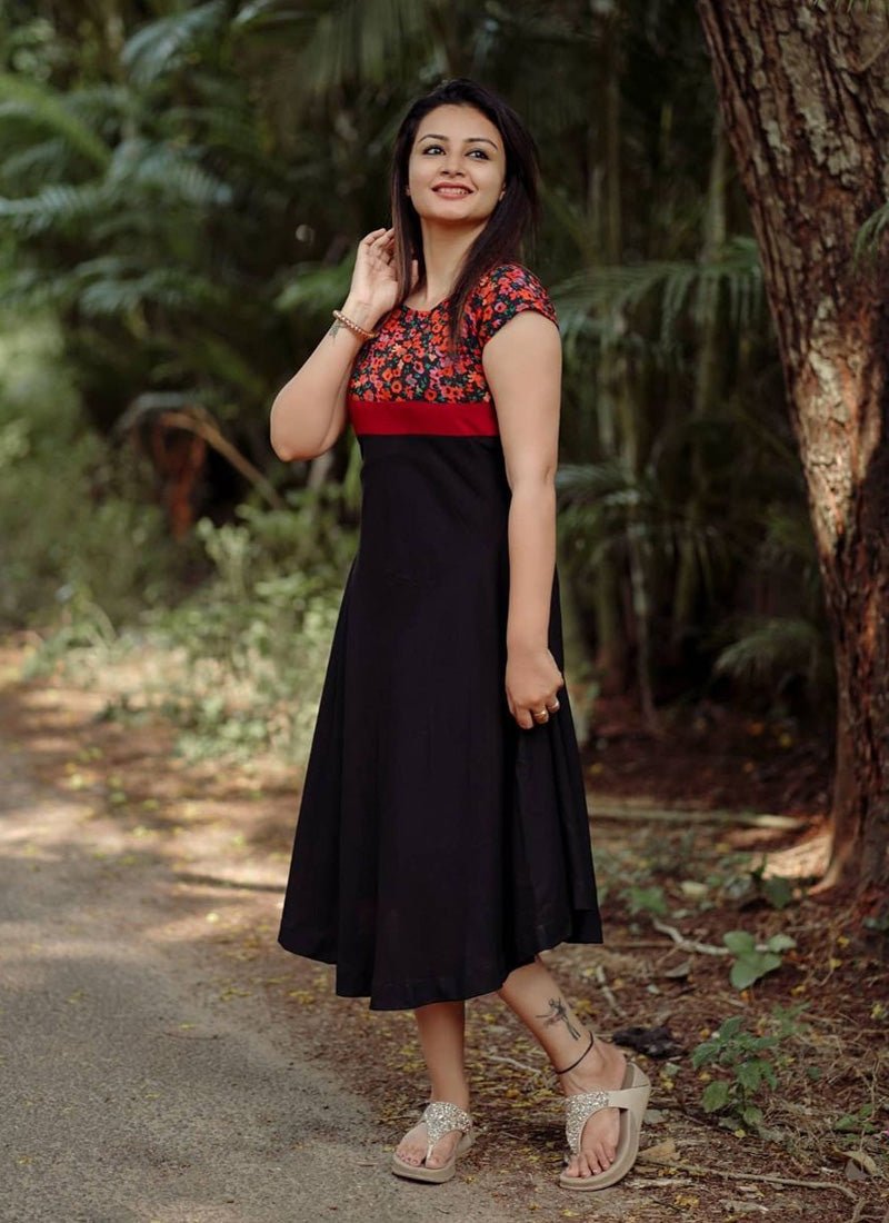 Red draped indo western dress by Divyam Mehta | The Secret Label